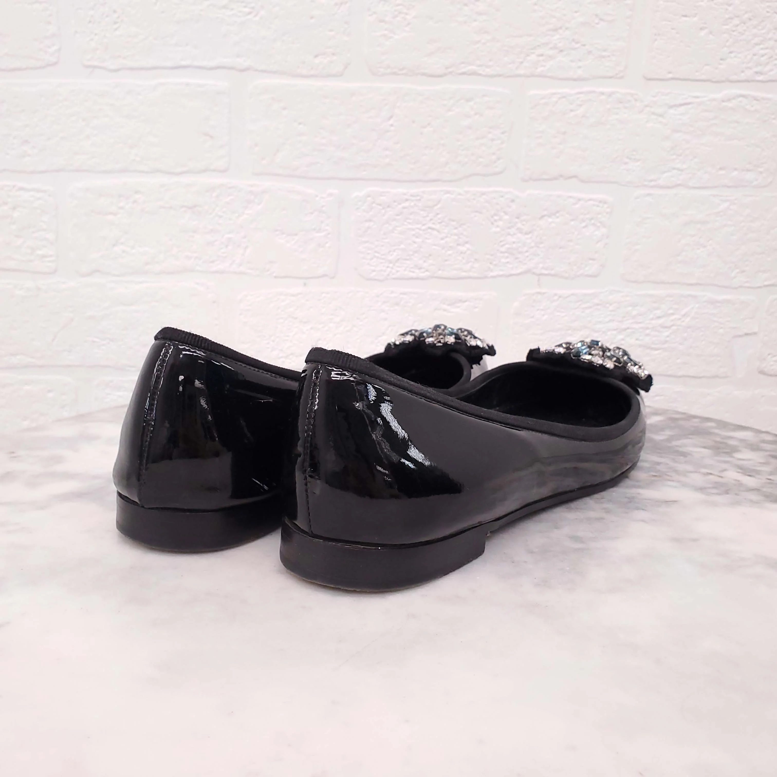 PRADA BLACK PATENT FLATS WITH CRYSTAL EMBLEM - SIZE 38.5 - Image 3